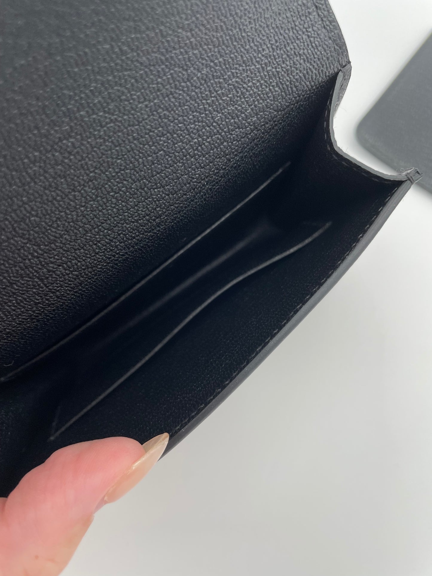 Pre-Loved 2023 Hermès Black Roulis Slim Wallet